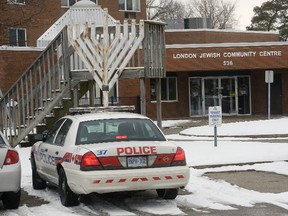 A police cruiser remained outside the London Jewish Community Centre on Huron Street Tuesday, Jan. 31 after a bomb threat forced the evacuation of the building and a nearby apartment. (MORRIS LAMONT, The London Free Press)