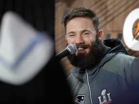 New England Patriots' Julian Edelman answers questions during opening night for the Super Bowl at Minute Maid Park on Jan. 30, 2017, in Houston. (AP Photo/David J. Phillip)