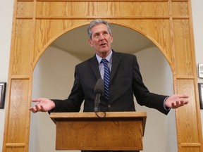 Premier Brian Pallister responds to media after meeting with the Manitoba Islamic Association at the Grand Mosque in Winnipeg on Tuesday. Pallister addressed topics such as the Quebec mosque shooting, indigenous night shooting and his time spent in Costa Rica. (THE CANADIAN PRESS/John Woods)