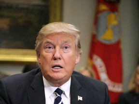 U.S. President Donald Trump delivers remarks at the beginning of a meeting with his staff and government cyber security experts in the Roosevelt Room at the White House January 31, 2017 in Washington, DC. (Photo by Chip Somodevilla/Getty Images)