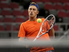 Canadian Peter Polansky practises at TD Place yesterday ahead of this weekend’s Davis Cup matches against Great Britain. (TONY CALDWELL/OTTAWA SUN)