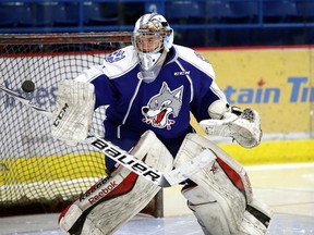 Sudbury Wolves netminder and Dowling native Mackenzie Savard makes a save during a recent practice. Savard got his first OHL start in two years Sunday and turned in a terrific performance. Gino Donato/The Sudbury Star