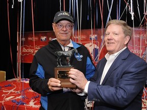 Ray Arsenault(left) won the $800,000 US first-place prize and an Eclipse Award as Horseplayer of the Year on Sunday. (Handout photo)