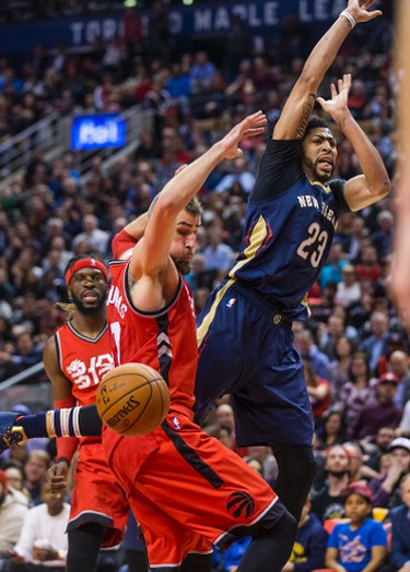 Toronto Raptors Jonas Valanciunas during overtime action against New Orleans Pelicans Anthony Davis at the Air Canada Centre in Toronto, Ont. on Tuesday January 31, 2017. Ernest Doroszuk/Toronto Sun/Postmedia Network