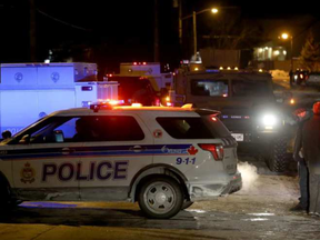A police standoff on a residential street off Stittsville's Main Street ended in a person being taken into custody after hours of police taking over the surrounding block Tuesday. JULIE OLIVER / POSTMEDIA