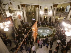 Press secretaries are always among the crowd of reporters, politicians and interest groups in the legislature's rotunda on budget day. This photo was captured on Oct. 27, 2015, after the provincial government delivered its Budget 2015.  Ian Kucerak/Postmedia Network