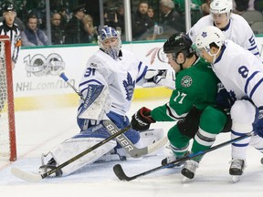 Stars centre Devin Shore (17) scores a goal against Maple Leafs goalie Frederik Andersen while Leafs defencemen Connor Carrick (8) and Jake Gardiner (51) defend during first period NHL action in Dallas on Tuesday, Jan. 31, 2017. (LM Otero/AP Photo)