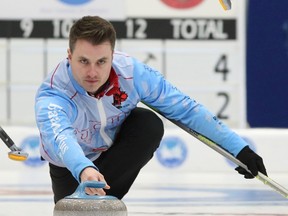 Skip Mark Bice takes a shot during his team’s 8-6 loss to Glenn Howard during the afternoon draw at the provincial men’s curling championship at the Cobourg Community Centre. (PETE FISHER/Postmedia Network)