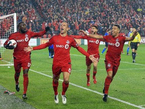 TORONTO, ON - NOVEMBER 30: Benoit Cheyrou #8 of Toronto FC celebrates a goal with teammates during the second half of the MLS Eastern Conference Final, Leg 2 game against Montreal Impact at BMO Field on November 30, 2016 in Toronto, Ontario, Canada. (Photo by Vaughn Ridley/Getty Images)  Montreal Impact v Toronto FC - Eastern Conference Finals - Leg 2
