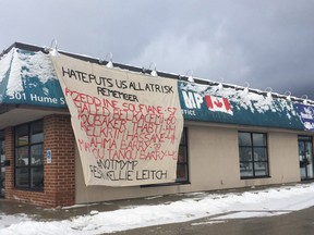 Police are investigating after a large banner was found hanging from Simcoe-Grey MP Kellie Leitch's constituency office in Collingwood, Wednesday. SUBMITTED