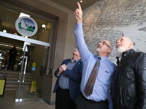 Jason Miller/The Intelligencer
Mayor Taso Christopher (centre) marvels at the renovated city hall main entrance with CAO Rick Kester and architect Bill White.