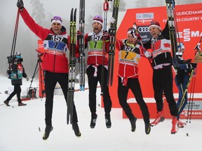 Members of the team of Canada (L-R) Len Valjas, Alex Harvey, Knute Johnsgaard and Devon Kershaw celebrate after placing third in the men's 4x7,5 km relay event at the FIS Cross Country skiing World Cup in Ulricehamn, Sweden, January 22, 2017. / AFP PHOTO / TT News Agency / Adam IHSE / Sweden OUTADAM IHSE/AFP/Getty Images
