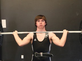 Sudbury weightlifter Joel Asselin, then 15, trains at The Basement Fitness in Sudbury in this file photo. Now 17, he is heading to the Ontario senior championships in March in Belleville, for athletes 20 and older. John Lappa/Sudbury Star