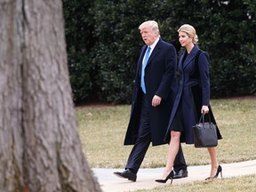 U.S. President Donald Trump and his daughter Ivanka walk to board Marine One on the South Lawn of the White House in Washington, Wednesday, Feb. 1, 2017. (AP Photo/Evan Vucci)