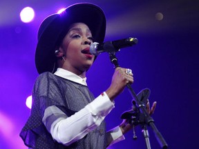 Lauryn Hill performing at Amnesty International's "Bringing Human Rights Home" Concert in New York. Hill took the stage in Pittsburgh, on Tuesday, Jan. 31, 2017, more than three hours late. (Photo by Evan Agostini/Invision/AP, File)