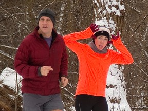 Mark Fenton and Stephanie Cardill train for an upcoming relay by running on the multi-use pathway along the Thames River in London. Fenton says his rule for shorts is down to -20 degrees, the he pulls on some pants. (Mike Hensen/The London Free Press)