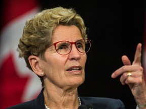 Premier Kathleen Wynne holds media availability after meeting with Toronto Mayor John Tory at Queen's Park in Toronto, Ont. on Monday January 30, 2017. (Craig Robertson/Postmedia Network)