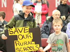 BRUCE BELL/THE INTELLIGENCER
Brothers Emerson (left) and Weston Byford were at PECI in Picton Wednesday evening for a public meeting on the Hastings and Prince Edward District School Board accommodation review. The brothers attend Sophiasburgh Central School and want to see their school saved.