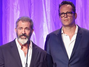 Mel Gibson (L) and Vince Vaughn speak at the Hollywood Foreign Press Association's Grants Banquet at the Beverly Wilshire Four Seasons Hotel on Aug. 4, 2016 in Beverly Hills, Calif.  (Photo by Kevin Winter/Getty Images)