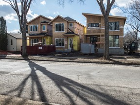 Infill houses under construction in the Westmount community on March 18, 2016. Shaughn Butts/Postmedia