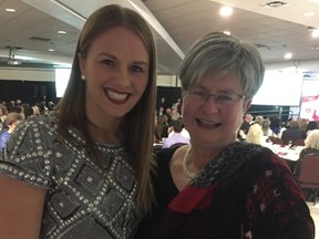 Erica Wiebe (left), named female athlete of the year at the Ottawa Sports Awards at Algonquin College, surprised her mom Paula Preston, presenting her with the Spirit of Sport Award. (Tim Baines/Ottawa Sun)