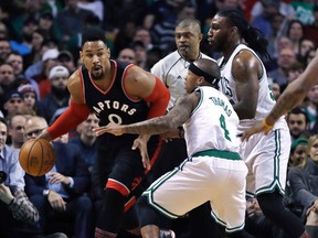 Raptors centre Jared Sullinger (0) is trailed by Celtics guard Isaiah Thomas (4) and forward Jae Crowder during first quarter NBA action in Boston on Wednesday, Feb. 1, 2017. (Charles Krupa/AP Photo)