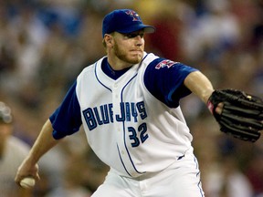 Blue Jays Roy Halladay pitches against New York Yankees in Skydome July 12, 2003. (File photo)