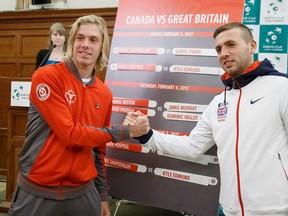 Denis Shapovalov of Canada and Dan Evans of Great Britain shake hands during the draw ceremony of the Davis Cup World Group tie between Great Britain and Canada at Parliament Hill on Feb. 2, 2017. (Andre Ringuette/Getty Images for LTA)