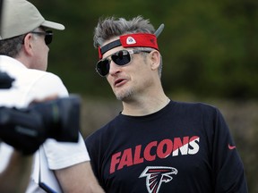 Falcons general manager Thomas Dimitroff (right) visits during a practice for Super Bowl 51 in Houston on Wednesday, Feb. 1, 2017. (Eric Gay/AP Photo)