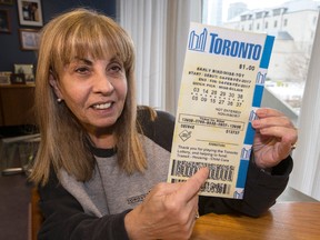 Toronto city councillor Frances Nunziata holds a mockup Toronto lottery ticket in her office  on Thursday, Feb. 2, 2017. Nunziata thinks the province should allow Toronto to run its own lottery. (CRAIG ROBERTSON/TORONTO SUN)
