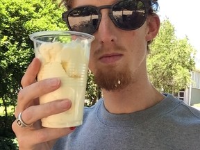 Evan Dunfee, seen here holding a cup of whipping cream in this undated handout photo, is part of a groundbreaking study at the Australian Institute of Sport on the effects of a low-carbohydrate, high-fat diet on endurance events. (THE CANADIAN PRESS/Handout/Evan Dunfee)