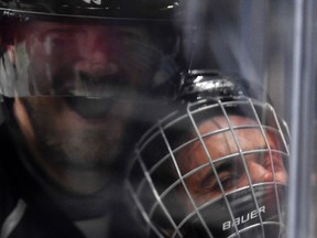 Singer Justin Bieber, who is playing for Team Gretzky, is pushed into the glass by Chris Pronger of Team Lemieux during the NHL All-Star Celebrity Shootout at Staples Center on Jan. 28, 2017. (AP Photo/Mark J. Terrill)