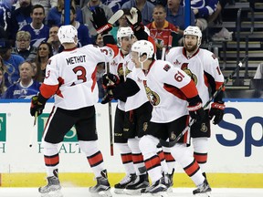 Senators right wing Mark Stone (61) celebrates with teammates, including defenceman Marc Methot (3), after scoring against the Lightning during second period NHL action in Tampa, Fla., on Thursday, Feb. 2, 2017. (Chris O'Meara/AP Photo)