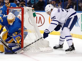 Maple Leafs' James van Riemsdyk (right) is unable to score past Blues goalie Jake Allen during third period NHL action in St. Louis on Thursday, Feb. 2, 2017. (Jeff Roberson/AP Photo)