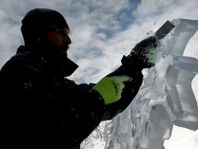 Artist Scott Harrison during the Winterlude ice carving competition Friday, February 3, 2017.