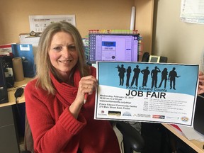 BRUCE BELL/THE INTELLIGENCER
Grace Nyman, community development coordinator for Prince Edward County, holds a poster for the upcoming Job Fair at the Prince Edward Community Centre on Feb. 22.