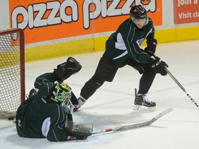 London Knights captain JJ Piccinich takes a shot on goaltender Tyler Parsons during practice. (file photo by MORRIS LAMONT, The London Free Press)