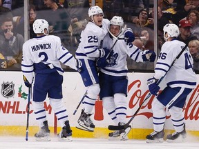 Toronto Maple Leafs' Auston Matthews celebrates his goal his goal with teammates during an NHL game against the Boston Bruins in Boston on Dec. 10, 2016. (AP Photo/Michael Dwyer)