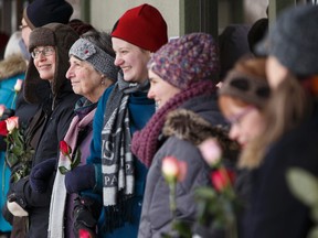 Edmontonians form a human chain around the MAC Islamic Centre and Rahma Mosque to show their support to the city's Muslims in Edmonton on Friday, Feb. 3, 2017.