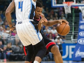 Toronto Raptors guard Kyle Lowry drives by Orlando Magic guard Elfrid Payton during an NBA game in Orlando on Feb. 3, 2017. (AP Photo/Willie J. Allen Jr.)