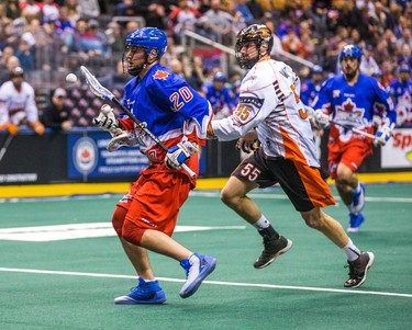 Toronto Rock Bradley Kri during 1st half action against Buffalo Bandits Mitch Wilde at the Air Canada Centre in Toronto, Ont. on Friday February 3, 2017. Ernest Doroszuk/Toronto Sun/Postmedia Network