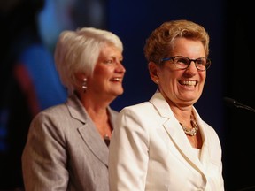 Ontario Liberal cabinet minister Liz Sandals (left) and Ontario Premier Kathleen Wynne. (TORONTO SUN/FILES)