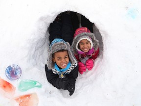 Isaac Ndlovu, 9, left, and his sister, Meliya, 6, play in the winter play zone area at Snow Day at Bell Park on Feb. 4, 2017. The day, which was presented by the City of Greater Sudbury in partnership with the Healthy Kids Community Challenge, featured a number of activities that included snowshoeing, skating, hiking, Indigenous games and storytelling, wagon rides, sledding, a petting zoo and a miniature snow maze. (John Lappa/Sudbury Star)