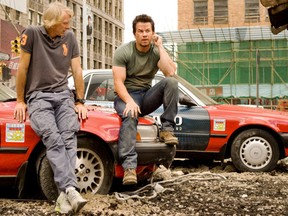Director Michael Bay, left, with Mark Wahlberg on the set of "Transformers: Age of Extinction." (AP Photo/Paramount Pictures, Andrew Cooper)