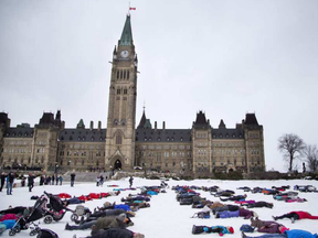 People made snow angels on Parliament Hill Saturday as part of a Canada-wide attempt to break a Guinness world record. The event was organized by The Canadian Ski Patrol.