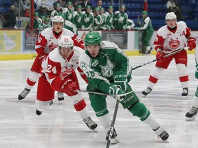 Drake Pilon, middle, of the Sudbury Wolves, rushes to the net during OHL action against the Soo Greyhounds at the Sudbury Community Arena in Sudbury, Ont. on Saturday February 4, 2017. John Lappa/Sudbury Star/Postmedia Network