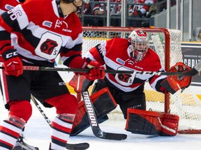 Ottawa 67's goalie Olivier Lafreniere catches the puck against the Niagara Ice Dog's on Jan. 28, 2017 at TD Place Arena. (Ashley Fraser/Postmedia)