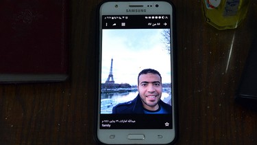 A picture taken on Feb. 5, 2017, shows a picture of Abdullah al-Hamahmy, an Egyptian suspected of being the machete attacker in Paris's Louvre museum, displayed on a phone at the family home in the Nile delta city of Mansura, some 120 km north of Cairo. (MAHMOOD SHAHIIN/AFP/Getty Images)