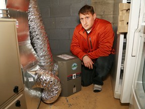 Robin Hawrelluk is not happy with a furnace filter that was installed at a house he owns in Val Caron. (John Lappa/Sudbury Star)
