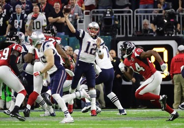New England Patriots' Tom Brady passes against the Atlanta Falcons during the first half of the NFL Super Bowl 51 football game Sunday, Feb. 5, 2017, in Houston. (AP Photo/Elise Amendola) ORG XMIT: NFL138